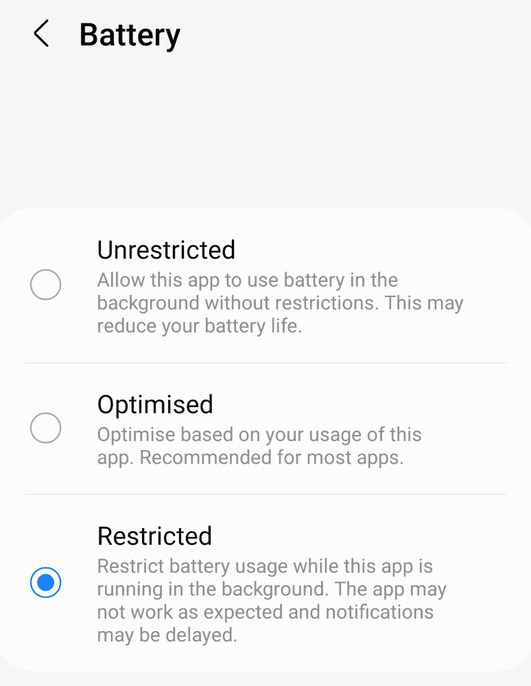 Android per-app Battery settings showing Unrestricted, Optimised and Restricted, with Restricted currently selected