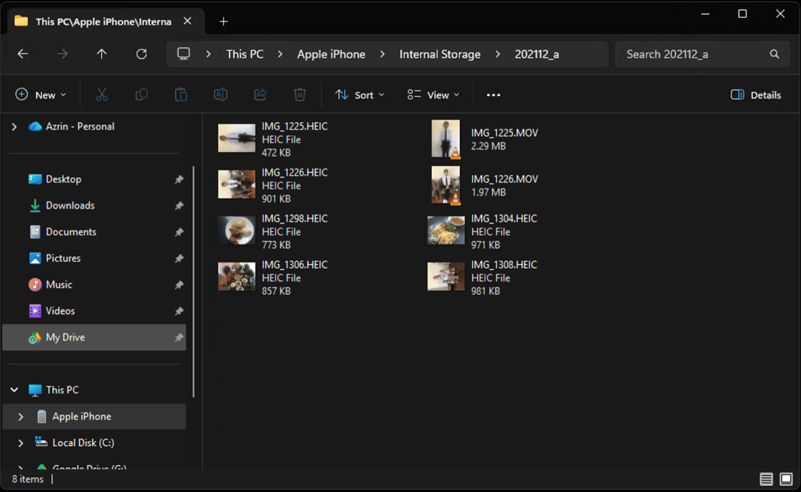 Windows File Explorer open at This PC, Apple iPhone, Internal Storage, showing iPhone .MOV video files ready to copy to the PC
